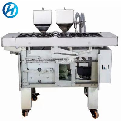 China Automatic Snack Cake High Capacity Custard Cake Manjoo Cake Making Machine for sale