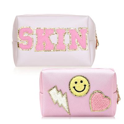 China Durable Embroidered Simple Multifunctional Makeup Bag Storage Makeup Bag Large Capacity Creative Waterproof Wash Bag for sale