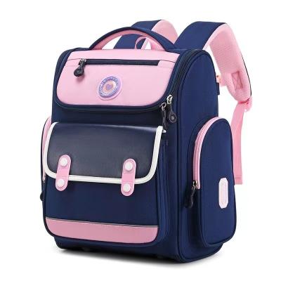 China Waterproof children's backpacks primary school students light up ultra boys to load reduction large capacity men's backpacks for sale