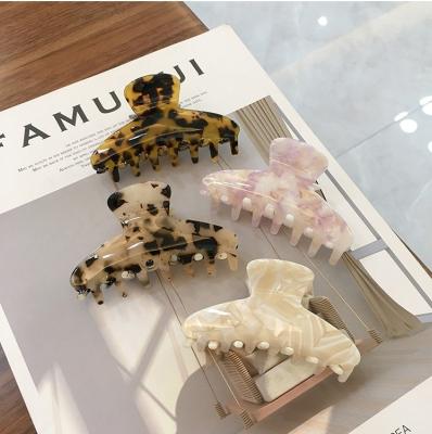 China Mordern Eco-friendly Curly Claw Clips Portable Colorful Leopard Marble Cellulose Acetate Hair Claw for sale