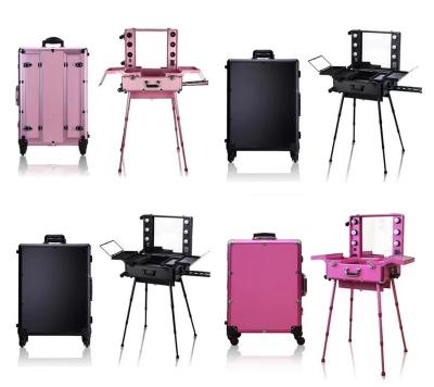 China Bohemian Aluminum Makeup Trolley Case With Light Mirror And Legs for sale