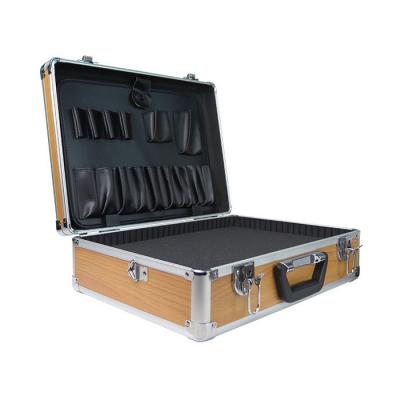 China Time 2021 Shockproof Wooden Cover Summer Small Portable Aluminum Tool Suitcase With Foam for sale