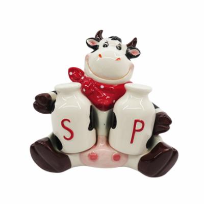 China Eco-friendly Creative Ceramic Handmade Ceramic Salt Shaker and Dolomite Cow S P Pepper Set with Tray for sale