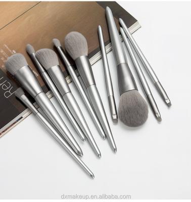 China Makes Apply HZM 10 PCS 2021eye Makeup And Face Beauty Tool Kit With Silver Makeup Bag Makeup Brush Set for sale