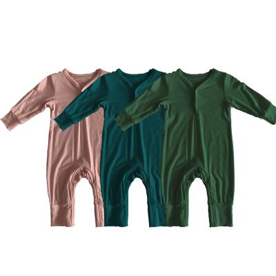 China Solid Color Bamboo Fiber Baby Romper Button Design Long Sleeve Baby Onesie Pajamas Suit Comfortable Girls Boys for sale