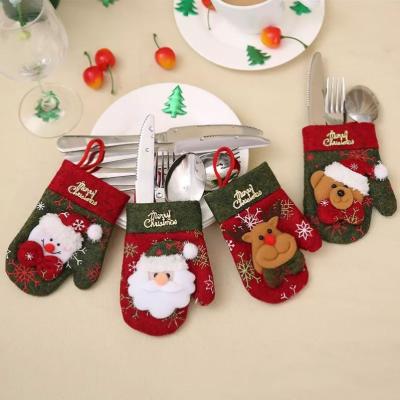 China Non - Woven New Christmas Decoration Supplies Restaurant Table Decorations Cutlery Knife Fork Bag Christmas Gift Bag for sale