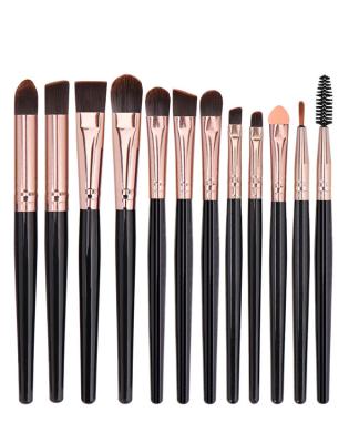 China Fan Brush 12pcs Beauty Makeup Brush Belt Eye Makeup Brush Set Black Face Makeup Brush Set for sale