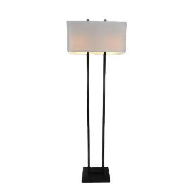 China Lighting Works Modern Designer Black Iron Standing Floor Lamp With White Fabric Lampshade For Hotel for sale