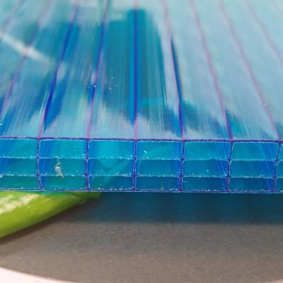 中国 Factory price 14mm blue four-layer Polycarbonate sheet with self-extinguishing and UV-resistant properties for facades and canopies 販売のため