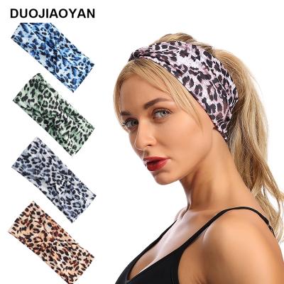 China Fashion women new color leopard print headband polyester knotted twist girl hair accessories wide headband for sale