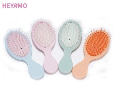 China Cushion HEYAMO Customized Peines To Tangle Baby Hair Brush Plastico Ninos Cepillos De Pelo Criancas Detangling Brush Private Label Wet Bag for sale