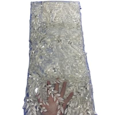 China Viable Luxury High Quality Transparent Crystal Sequins Beads White Tube Embroidery 3D Lace Rice Satin Tulle Lace Wedding Dress Fabric for sale