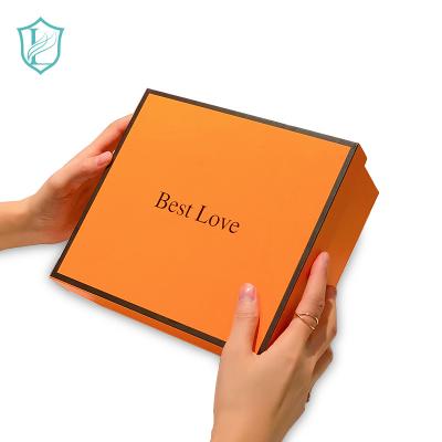 China Handmade Stain Orange Gift Box In Stock Cosmetic Perfume Box Packaging Boxes Biodegradable Packaging Wholesale Can Be Customized for sale