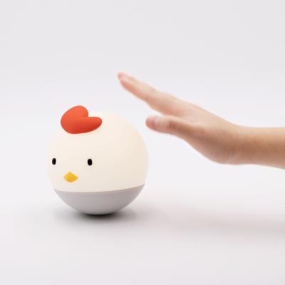 China Creative Eco-friendly LED Warm Light Tumbler Chicken Silicone Kids Night Light for sale