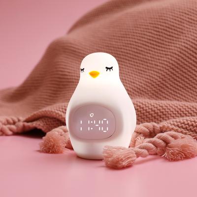 China Cute Eco-friendly Penguin Baby Kids Sleep Alarm Clock Penguin Night Light For Wedding Gifts for sale