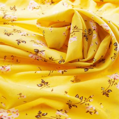 China Yellow Elastic Stretch Floral Print Dress Fabric Woven Polyester Swimwear Fabric For Women for sale