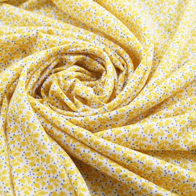 China Yellow Stretch Flower Print Garment Textile Small Ground 100% Polyester Elastane Fabric for sale