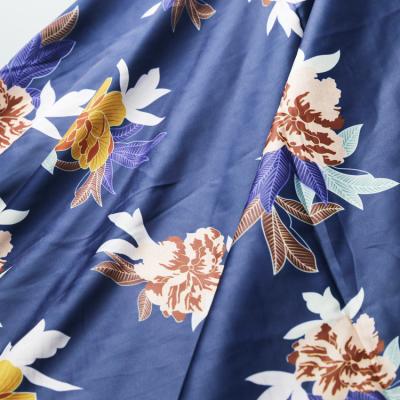 China Wholesale Memory Blue Ground Matte Flower Print Polyester Satin Bridal Fabric For Women Garment for sale