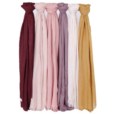 China Selling Solid Color Sunscreen Breathable Warm Shawl Islamic Malaysian Cotton And Canvas Shawl Hijab Women for sale