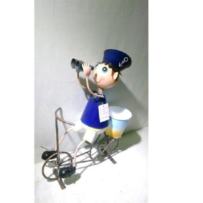 China Europe boy on bicycle with pot bicycle metal doll with flower pot for garden decoration for sale