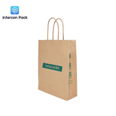 China 4C Offset Embossed Kraft Shopping Bags With Handles Gravure Printing Te koop