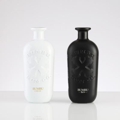 China Logo Beverage Embossed Black Matte Wholesale 750ml Glass Bottles For Liquor 750ml Vodka Glass Bottle With Cork for sale