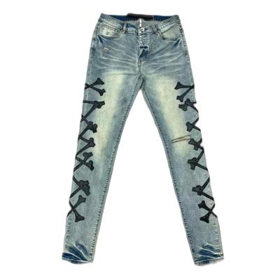 China High Quality 100% Cotton Fashion Brand Street Style Laser Cut Bone Embroidery Wash Hole Jeans Pants Mens Jeans for sale