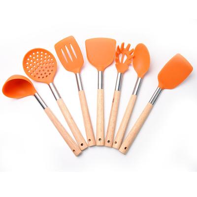 China Sustainable 7pcs Silicone Cookware Set With Beech Wood Handle for sale