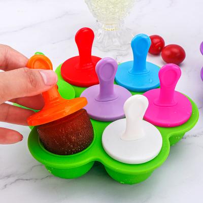 China Sustainable Round Shape 7 Cavity Silicone Popsicle Mold With Cream Sticks Plastic Jelly Ice Cube Tray for sale