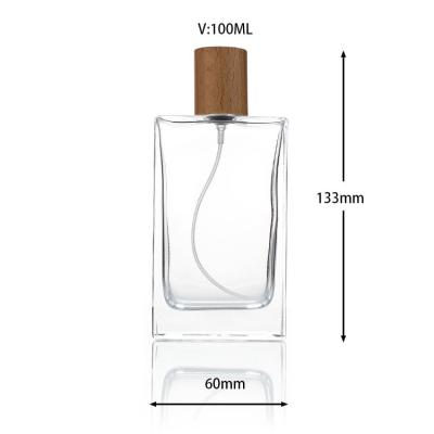 China New 100ml Refillable Wooden Cap Perfume Bottle Flat Square Perfume Bottle for sale