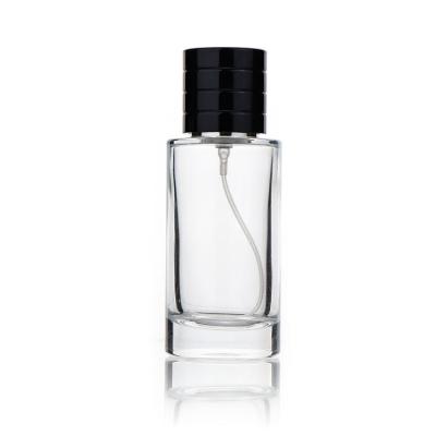 China Chinese Supplier Empty Clear Round Cylinder Perfume Bottles Cylinder Perfume Bottles With Black Lid for sale