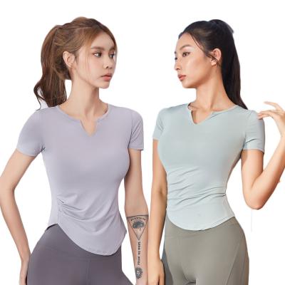 China Low Waist Gym Fitness Seamless Tops Breathable Comfortable Stretchy Short Sleeve Sportswear Tops For Women for sale