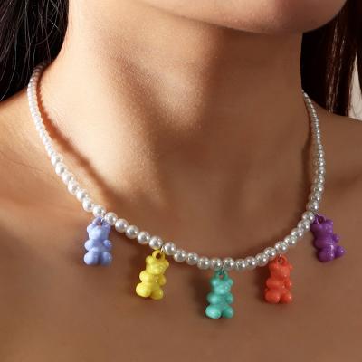 China FASHIONABLE hot selling handmade pearl bead scarf women girls with colorful resin gummy bear charm necklace for sale