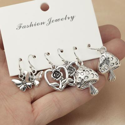 China Vintage Baroque Design Silver Butterfly Rose Mushroom Charm Dangle Earrings Set For Women Girls for sale