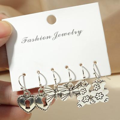 China Cute Vintage Girls Heart Butterfly Charm Drop Earring Silver Plated Cute Bear Dangle Earrings Set for sale