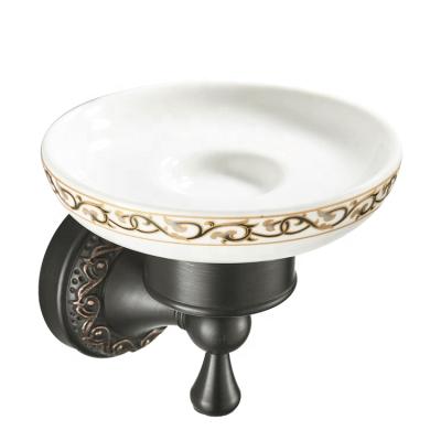 China Household Wholesale Retro Style Wall Mounted Round Chassis Embossed Black Soap Dish Holder for sale