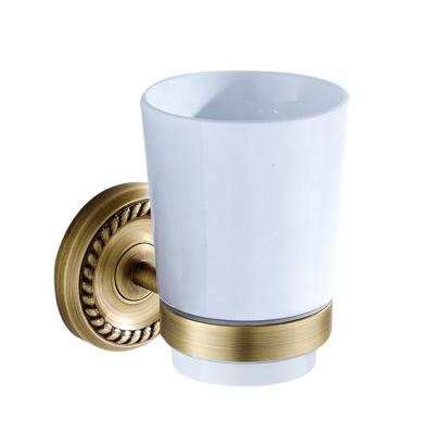 China Wall Mounted White Ceramic Mouthwash Chassis Single Cup Holder Bathroom Modern Classic Round Bronze Copper Hardware for sale