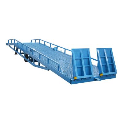 中国 Qiyun Brand 8-12t Hydraulic Bridge Dock Leveler Container Forklift Loading Ramp Truck Loading and Unloading the Goods 販売のため