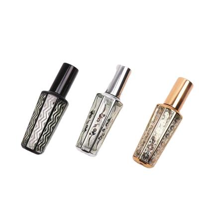 China 15ml Mini Spray Perfume Bottle Cosmetic UV Plating Gold Cut Out Sample Refillable Perfume Glass Bottle Cosmetic Packaging Bottle for sale