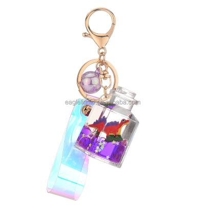 China Plastic Liquid Cute Dinosaur 3D Novelty Quicksand Bottle Keychains Bag Floating Keychain for sale