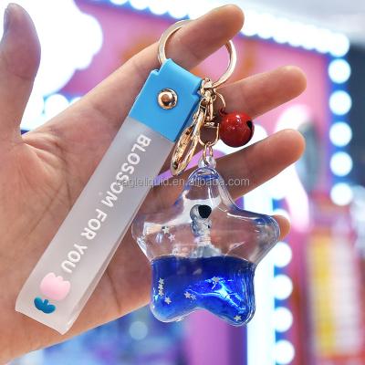 China Creative Space Plastic Moving Liquid Pointed Man Keychain Five Star Floating Keyring Keyfob Quicksand Astronaut for sale