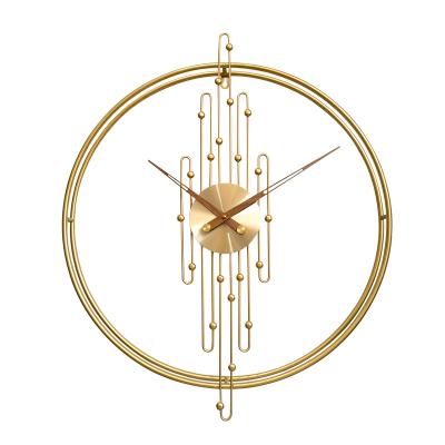 China Modern Spanish Art Double Circle Wall Clocks Large Iron Golden Minimal Art Beads Specialty Wall Hanging Decor for sale