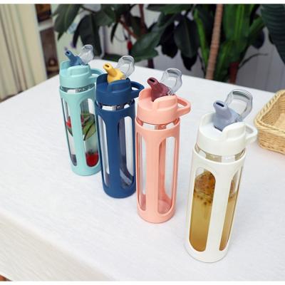 China New Design 202 Sustainable Eco-Friendly Motivational Silicone Glass Water Bottle With Straw for sale