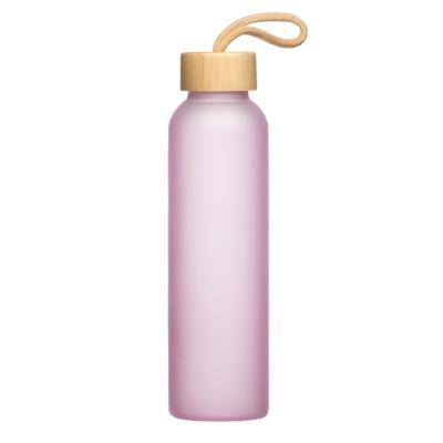 China Sustainable 25oz 32oz Color Painted Frosted Glass Water Bottle With Bamboo Lid for sale