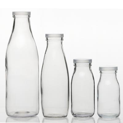 China Glass Beverage 500ml 1liter Coconut Milk Beverage Storage Bottle for sale