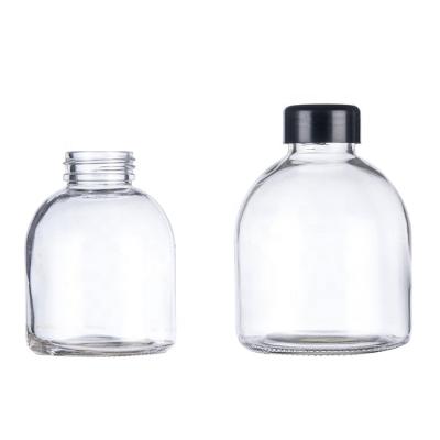 China Beverage China Factory Custom Transparent Glass Coffee Round Bottle for sale