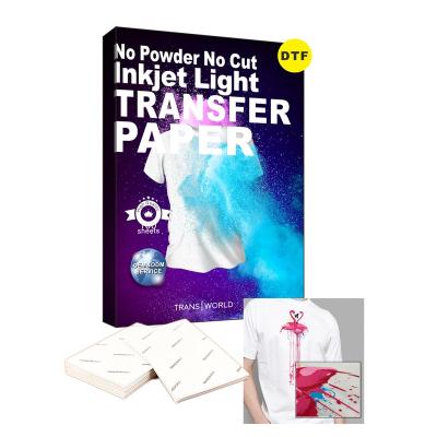 China Apparel Transworld Inkjet Light Custom Printable Transfer Paper Dust No No Trace Heat DTF Transfer Paper For Cotton T-shirt for sale