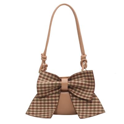 China Fashion Cute Bowtie Crossbody Bag Women PU Leather Handbag Clips 2023 New Lovely Fashionable Armpit Shoulder Bags for sale