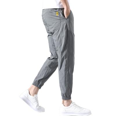 China Promotional Price Men's Casual Slim Fit Breathable Long Pants Anti-pilling Fashion Dress Pants Quick-Drying Pants for sale