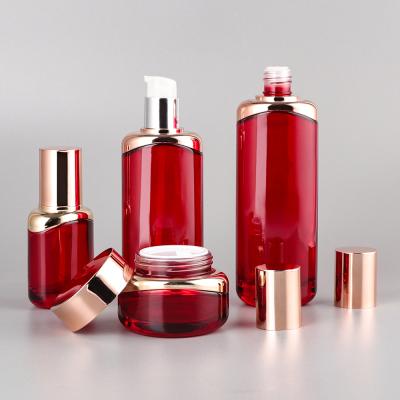 China High Qiality Manufacturer Custom Luxury High Price Red Skin Care Lotion Glass Bottle Jars Set Rose Gold Cosmetic Packaging for sale